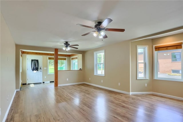 516 5th St, Darlngtn Twp, PA 16115 - unfurnished living room with light wood-style flooring and ceiling fan