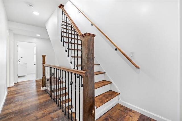211 Taylor St, Bloomfield, PA 15224 - stairs featuring wood finished floors and recessed lighting