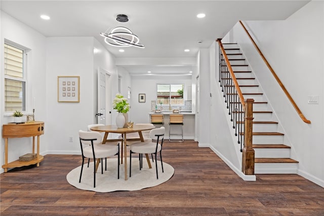 211 Taylor St, Bloomfield, PA 15224 - dining room with stairway, wood finished floors, and recessed lighting