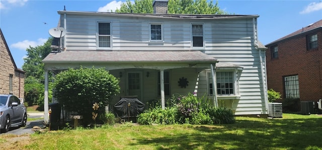 69 Princeton Ave, Uniontown, PA 15401 - view of front of home with a chimney and a front yard