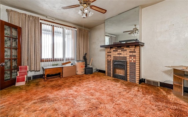 4123 Stanley St, Greenfield, PA 15207 - carpeted living area with ceiling fan, a fireplace, and a textured wall
