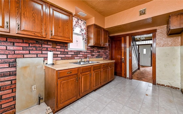 4123 Stanley St, Greenfield, PA 15207 - kitchen featuring light countertops and brown cabinetry