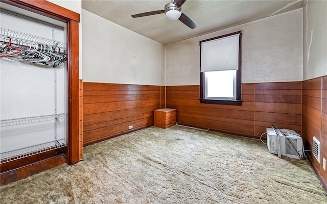 4123 Stanley St, Greenfield, PA 15207 - spare room featuring a ceiling fan, a wainscoted wall, carpet, and wooden walls