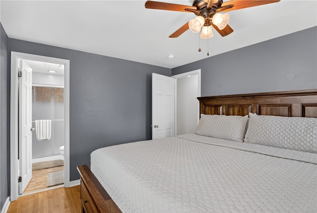 1171 La Salle Rd, Monroeville, PA 15146 - bedroom with light wood-style flooring, ceiling fan, and connected bathroom