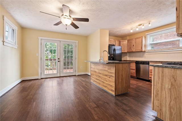 2072 Dartmore St, Overbrook, PA 15210 - kitchen featuring dishwasher, black fridge, dark wood-style floors, plenty of natural light, and a textured ceiling