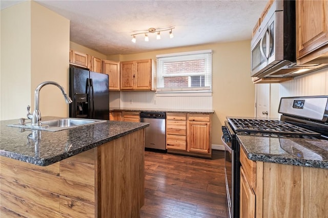 2072 Dartmore St, Overbrook, PA 15210 - kitchen featuring appliances with stainless steel finishes and dark wood finished floors