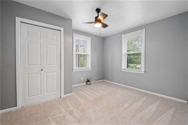 2072 Dartmore St, Overbrook, PA 15210 - unfurnished bedroom with carpet floors, a closet, and a ceiling fan