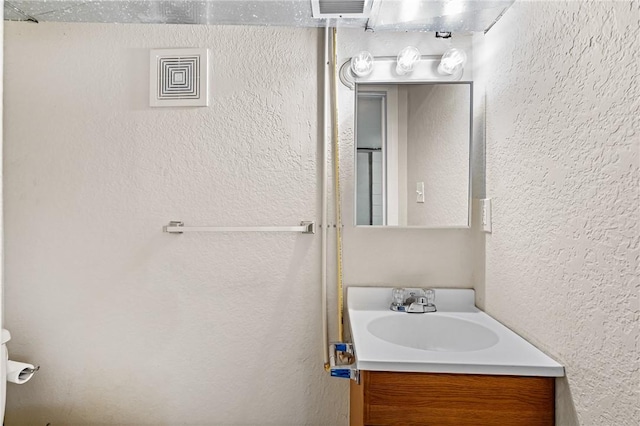 312 Edith St, Mt Washington, PA 15211 - bathroom with vanity and a textured wall