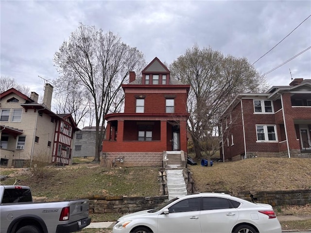 26 Carrick Ave, Carrick, PA 15210 - american foursquare style home featuring brick siding