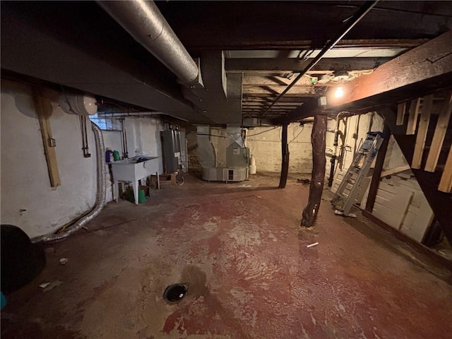 26 Carrick Ave, Carrick, PA 15210 - unfinished below grade area with heating unit and water heater
