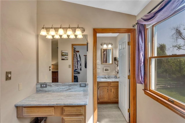 116 Rizzi Dr, Penn Twp Wml, PA 15642 - bathroom featuring vanity and wood finished floors
