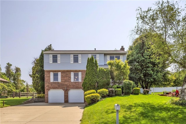 116 Rizzi Dr, Penn Twp Wml, PA 15642 - view of front of house featuring driveway, brick siding, an attached garage, and a chimney