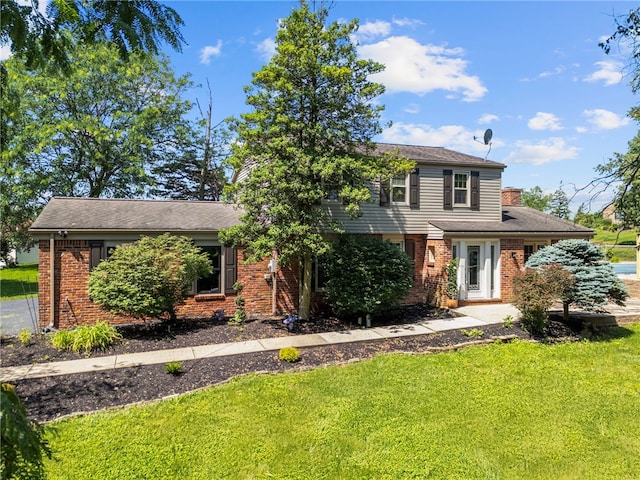 1202 Oakridge Rd, South Fayette, PA 15057 - view of front of property featuring brick siding and a front yard