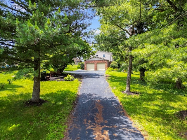 1202 Oakridge Rd, South Fayette, PA 15057 - view of front of home featuring a front lawn and asphalt driveway