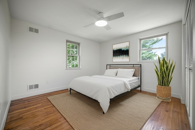 1202 Oakridge Rd, South Fayette, PA 15057 - bedroom with multiple windows, wood finished floors, and ceiling fan