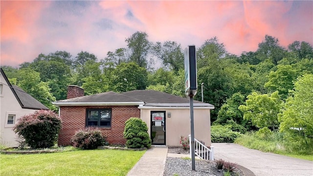 408 Rodi Rd, Penn Hills, PA 15235 - view of front of home featuring a chimney and a front yard