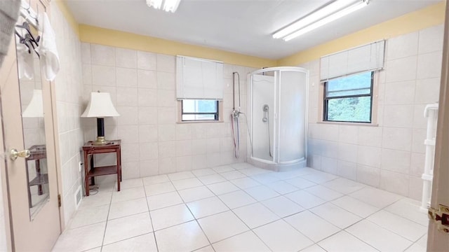 408 Rodi Rd, Penn Hills, PA 15235 - full bathroom with a stall shower, tile patterned floors, and tile walls