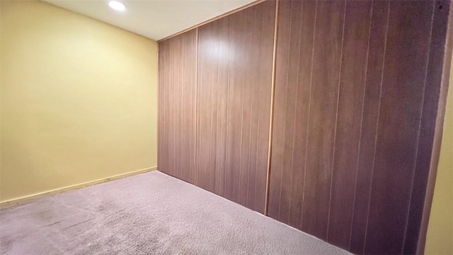 408 Rodi Rd, Penn Hills, PA 15235 - carpeted empty room featuring wooden walls and recessed lighting