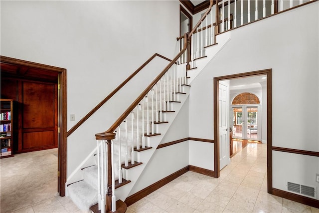 1648 Blackburn Heights Dr, Ohio Twp, PA 15143 - stairway featuring a high ceiling and french doors