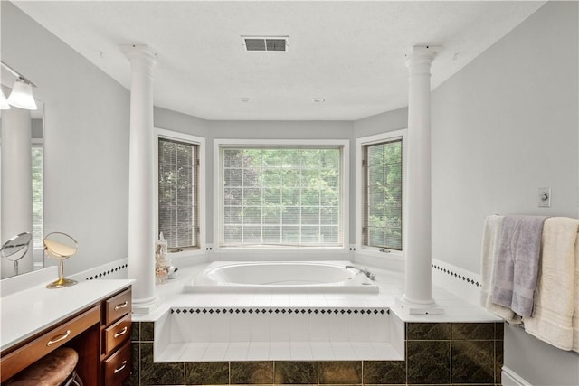1648 Blackburn Heights Dr, Ohio Twp, PA 15143 - bathroom featuring a bath, vanity, and ornate columns