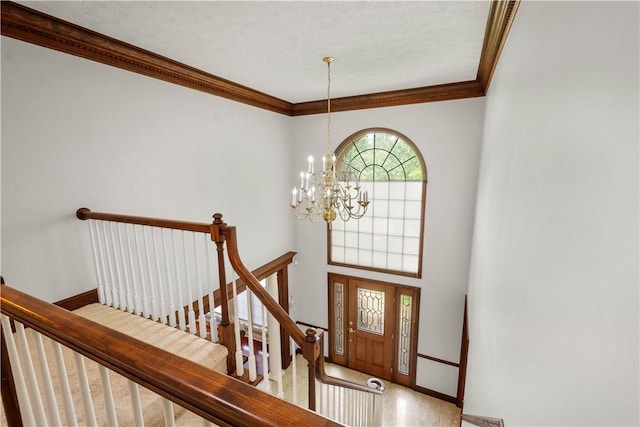 1648 Blackburn Heights Dr, Ohio Twp, PA 15143 - foyer featuring a chandelier and ornamental molding