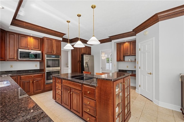 1648 Blackburn Heights Dr, Ohio Twp, PA 15143 - kitchen with stainless steel appliances, crown molding, a kitchen island, glass insert cabinets, and hanging light fixtures