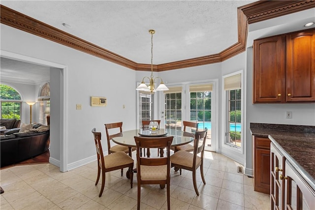 1648 Blackburn Heights Dr, Ohio Twp, PA 15143 - dining space featuring ornamental molding, light tile patterned flooring, a textured ceiling, and a chandelier