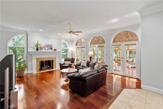 1648 Blackburn Heights Dr, Ohio Twp, PA 15143 - living area featuring ornamental molding, a ceiling fan, french doors, recessed lighting, and a fireplace with flush hearth