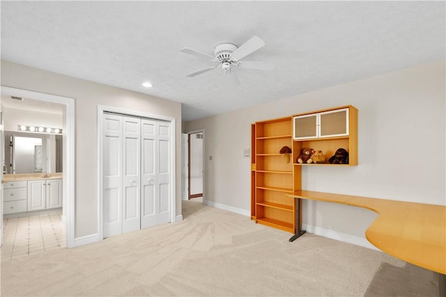 1648 Blackburn Heights Dr, Ohio Twp, PA 15143 - unfurnished bedroom with a closet, light carpet, connected bathroom, a ceiling fan, and recessed lighting