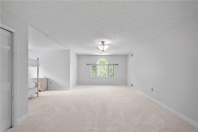 1648 Blackburn Heights Dr, Ohio Twp, PA 15143 - carpeted empty room featuring baseboards and a textured ceiling