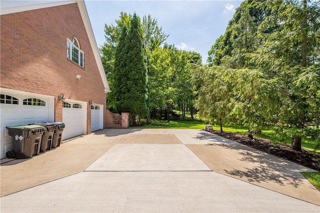 1648 Blackburn Heights Dr, Ohio Twp, PA 15143 - view of property exterior with concrete driveway and an attached garage