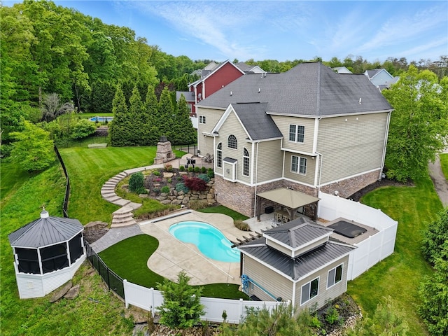 322 Dirkshire Ct, Adams Twp, PA 16046 - back of property featuring a gazebo, a fenced backyard, a patio area, and stone siding