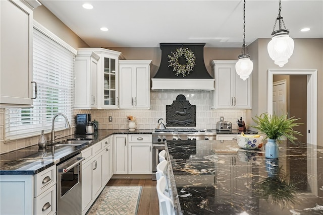 322 Dirkshire Ct, Adams Twp, PA 16046 - kitchen with premium range hood, dishwasher, hanging light fixtures, white cabinetry, and recessed lighting