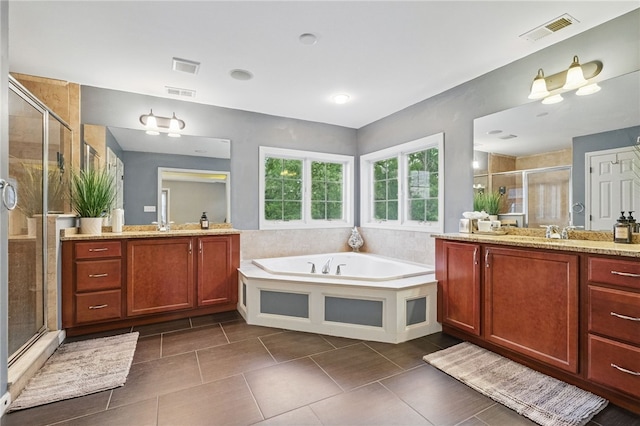 322 Dirkshire Ct, Adams Twp, PA 16046 - full bath featuring a stall shower, two vanities, a bath, and tile patterned flooring