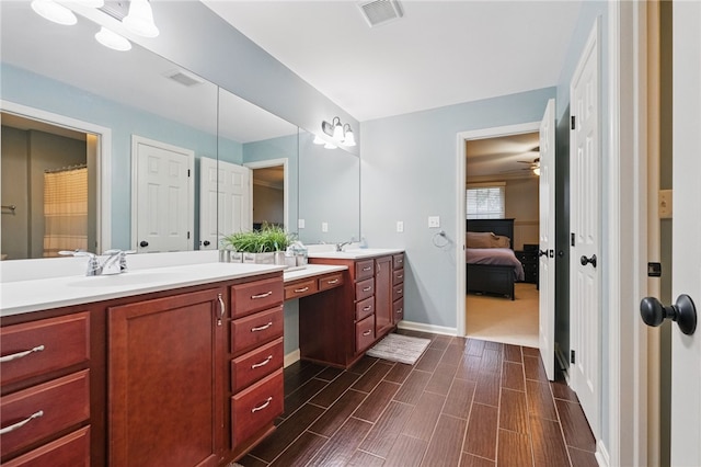 322 Dirkshire Ct, Adams Twp, PA 16046 - full bathroom with double vanity, ensuite bathroom, wood finish floors, and a ceiling fan