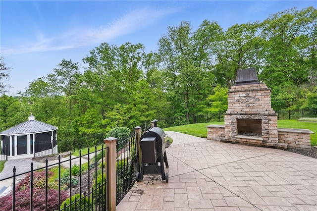 322 Dirkshire Ct, Adams Twp, PA 16046 - view of patio / terrace with an outdoor stone fireplace and a gazebo