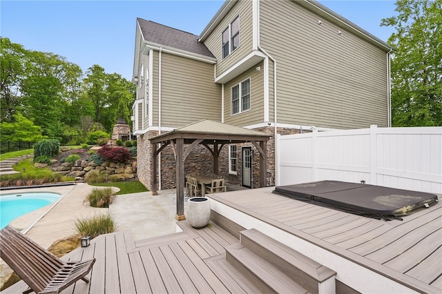 322 Dirkshire Ct, Adams Twp, PA 16046 - wooden terrace with a gazebo, a covered hot tub, an outdoor pool, and a patio