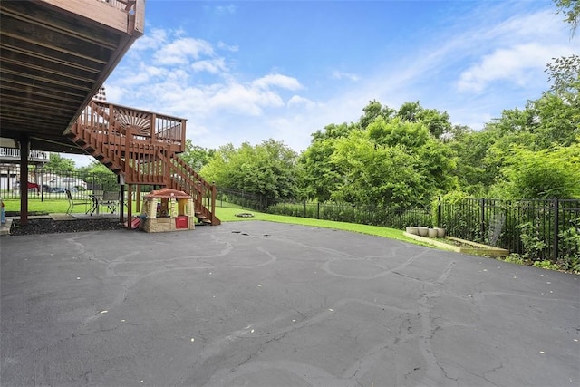 196 Oakbrook Cir, Banksville/Westwood, PA 15220 - fenced backyard with stairway, a deck, and a patio
