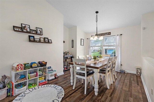 196 Oakbrook Cir, Banksville/Westwood, PA 15220 - dining area with a chandelier and dark wood finished floors