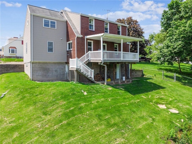 585 Dugan Way, New Kensington, PA 15068 - rear view of house with a wooden deck, stairway, and brick siding