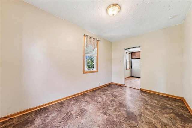 585 Dugan Way, New Kensington, PA 15068 - empty room featuring baseboards and a textured ceiling
