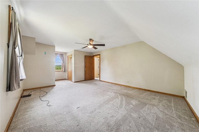 585 Dugan Way, New Kensington, PA 15068 - additional living space with light colored carpet, ceiling fan, and vaulted ceiling