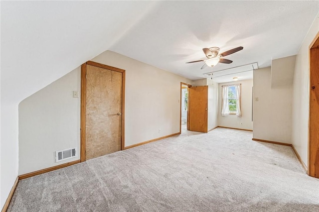 585 Dugan Way, New Kensington, PA 15068 - unfurnished bedroom with carpet flooring, ceiling fan, and vaulted ceiling