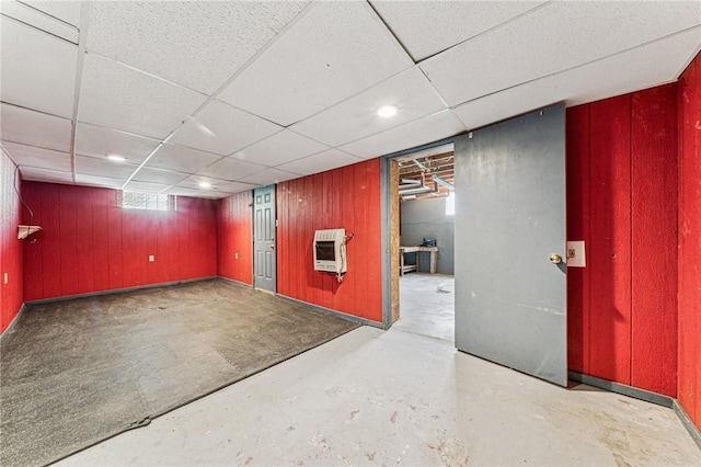 585 Dugan Way, New Kensington, PA 15068 - basement featuring heating unit, wood walls, and a paneled ceiling