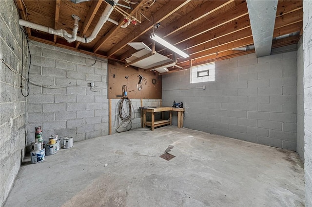 585 Dugan Way, New Kensington, PA 15068 - below grade area with concrete block wall and a workshop area