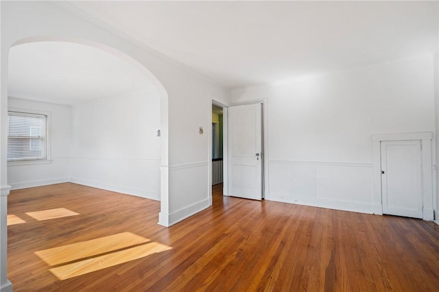 1216 Laclair Ave, Regent Square, PA 15218 - unfurnished room featuring arched walkways and wood finished floors
