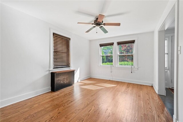 1216 Laclair Ave, Regent Square, PA 15218 - unfurnished living room with wood finished floors and ceiling fan