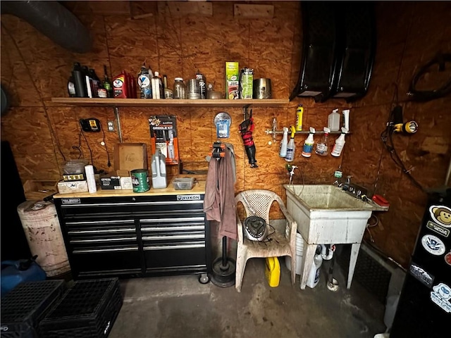 206 Pine St, Connellsville, PA 15425 - miscellaneous room featuring unfinished concrete floors and a workshop area