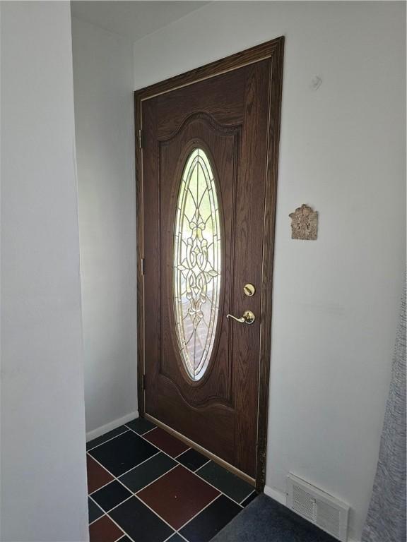 46 Corbett Ave, Hempfield Twp Wml, PA 15642 - foyer entrance featuring baseboards