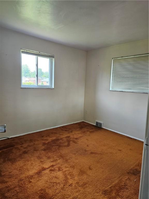 46 Corbett Ave, Hempfield Twp Wml, PA 15642 - unfurnished room featuring carpet and baseboards